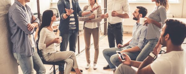 Successful,Young,Business,People,Are,Talking,And,Smiling,During,The